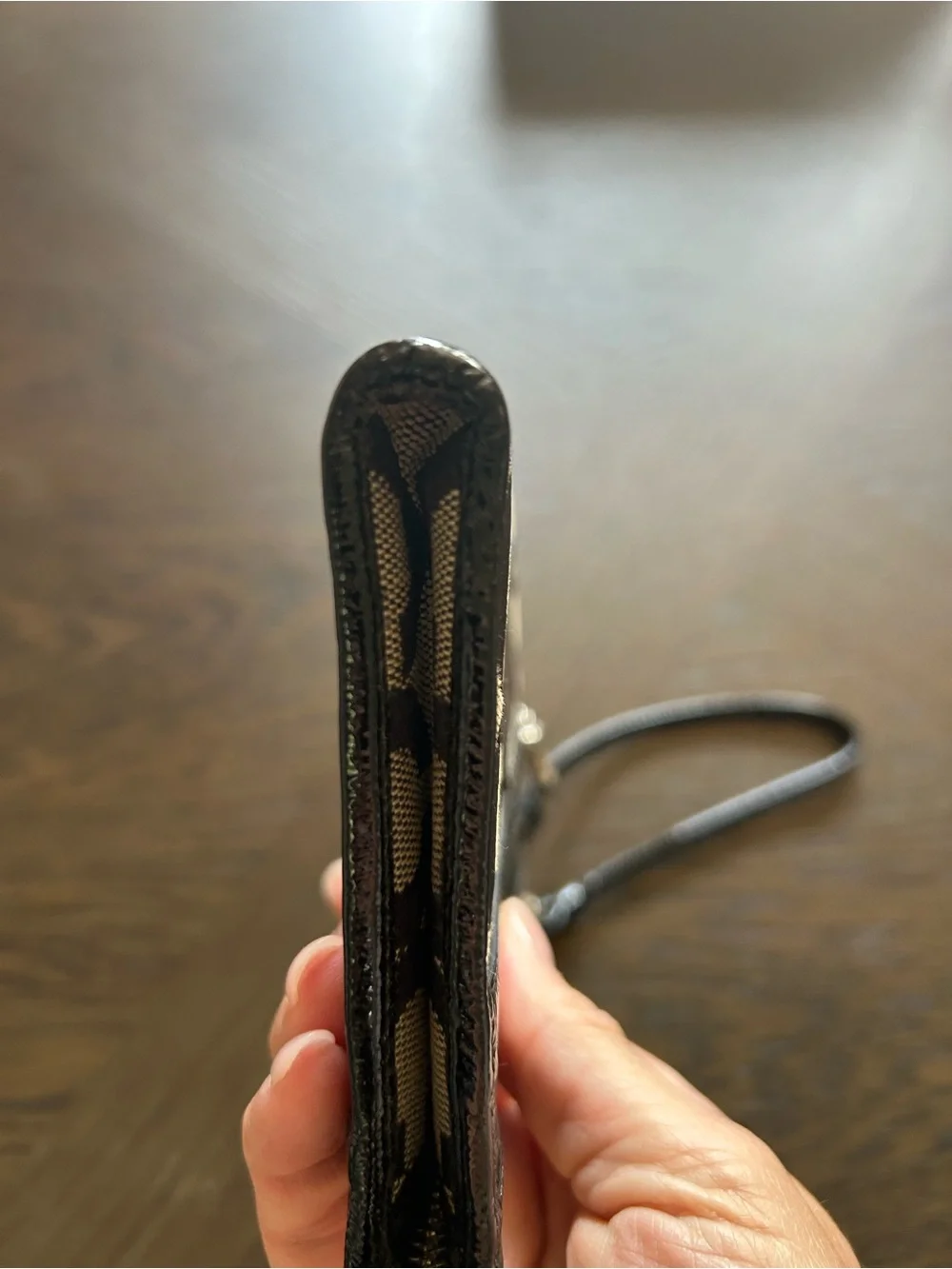 Coach Poppy Black and Cream Signature Wristlet